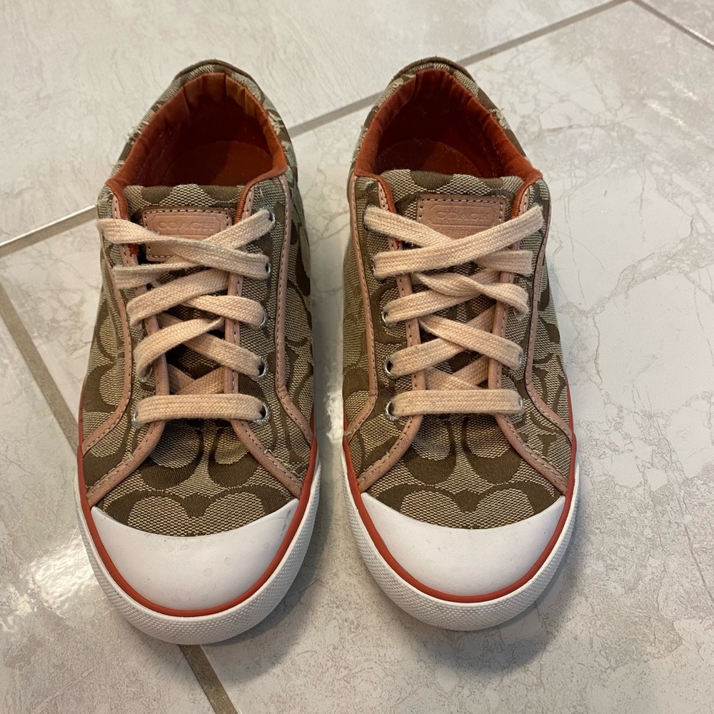 Coach tennis shoes. Size 6. Some worn areas (pictured). Good condition.